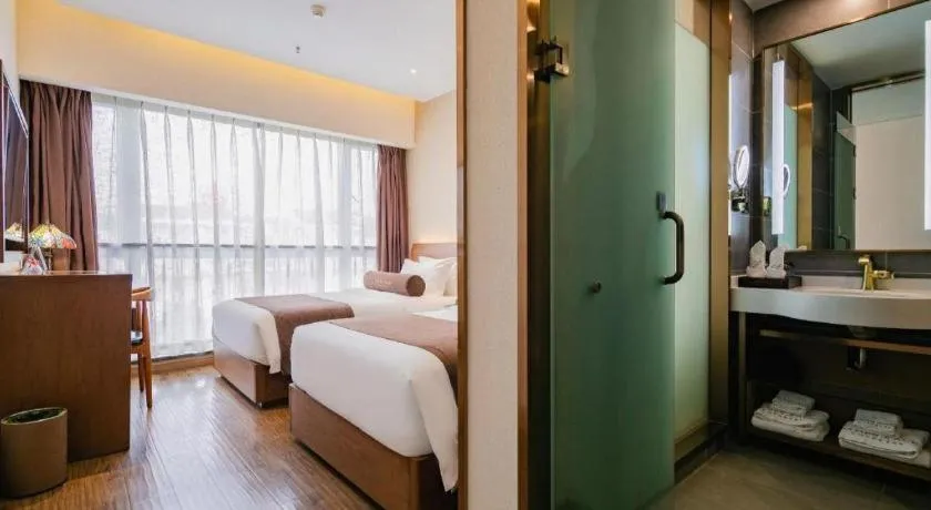 Bed in James Joyce Coffetel Chengdu Jichang Road Shenxianshu