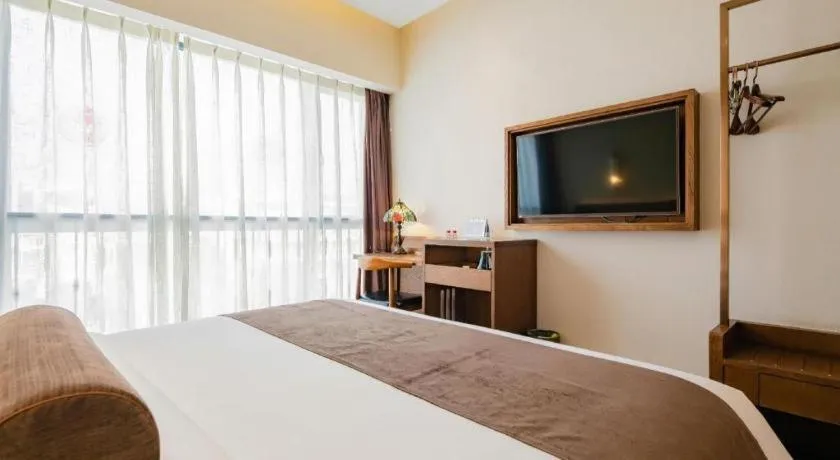 Bed in James Joyce Coffetel Chengdu Jichang Road Shenxianshu