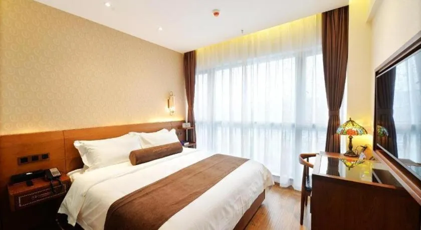 Bed in James Joyce Coffetel Chengdu Jichang Road Shenxianshu