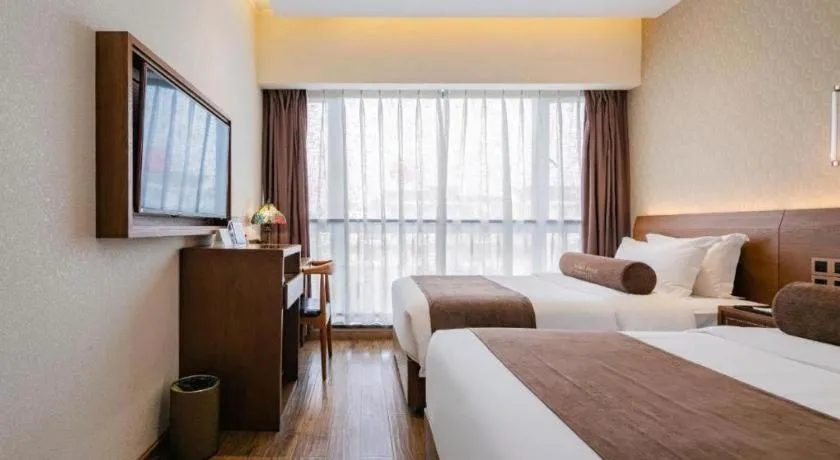 Bed in James Joyce Coffetel Chengdu Jichang Road Shenxianshu