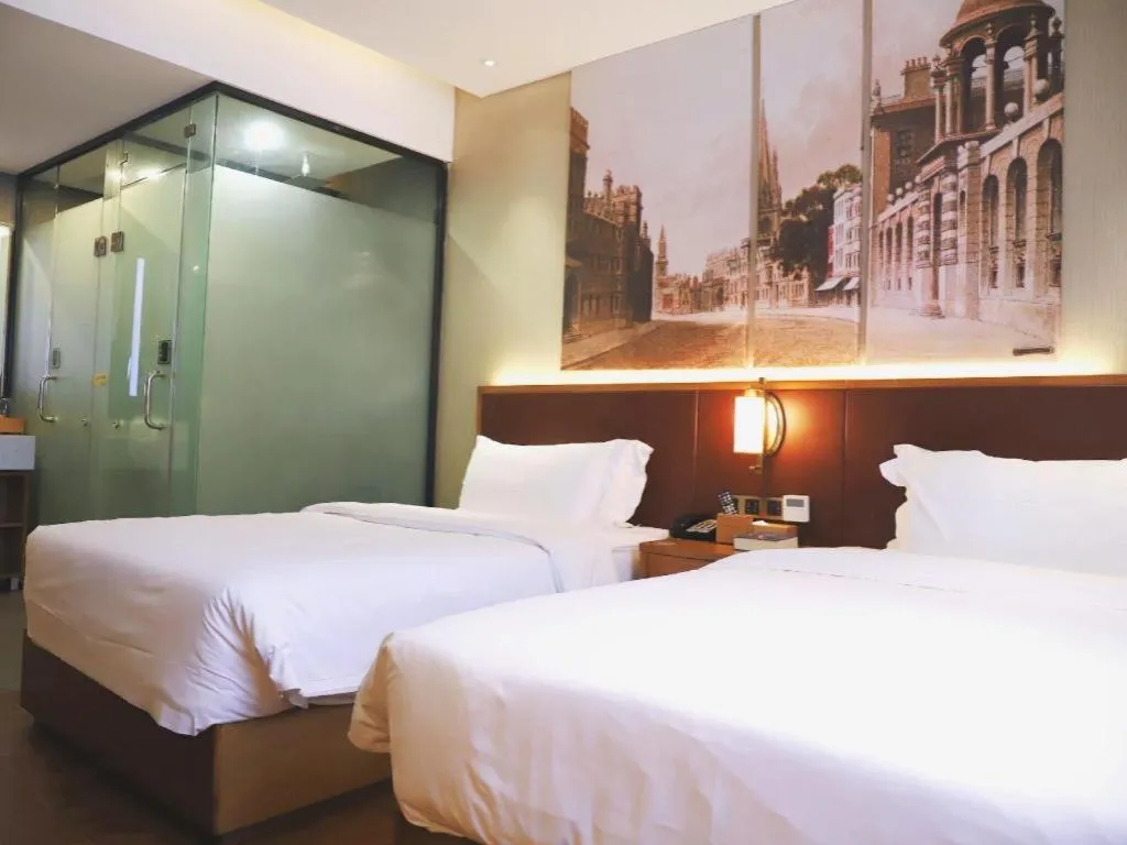 Bed in James Joyce Coffetel Guangzhou Dongxiaonan Metro Station Branch