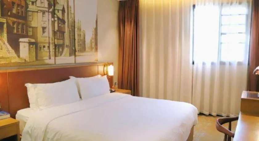 Bed in James Joyce Coffetel Guangzhou Dongxiaonan Metro Station Branch