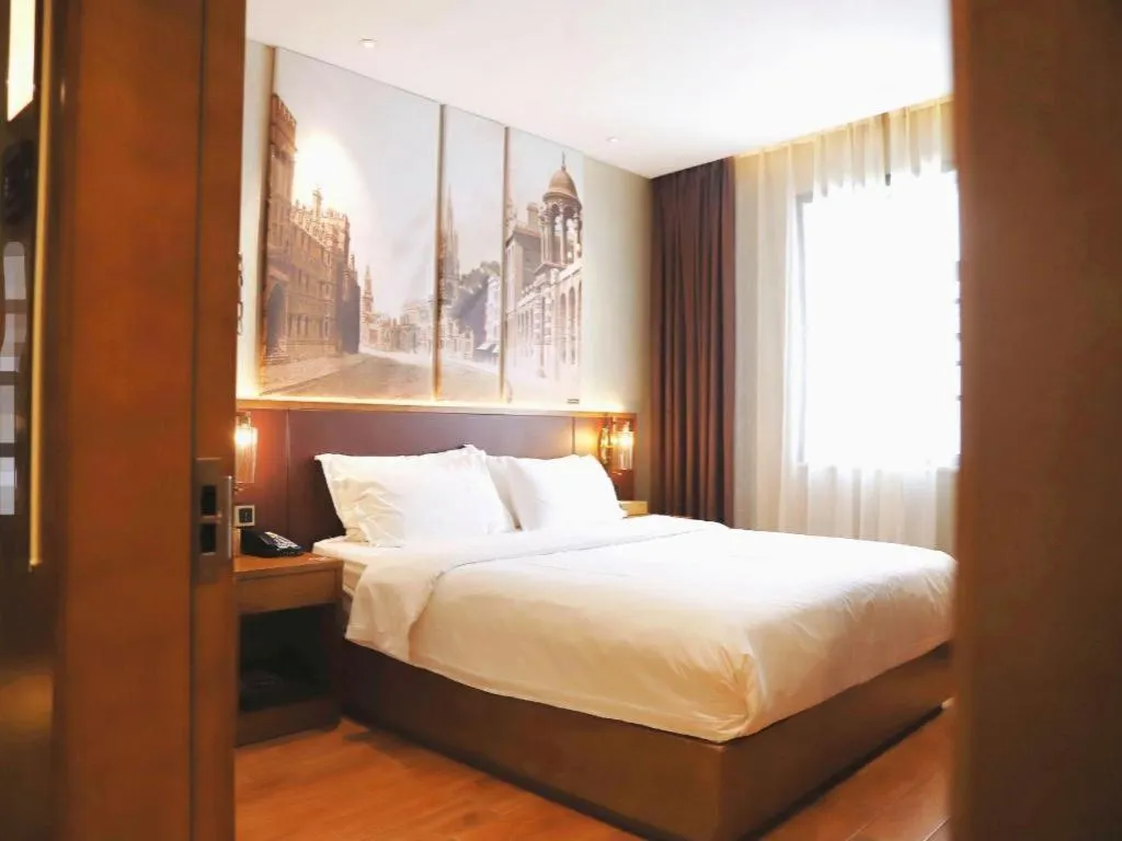 Bed in James Joyce Coffetel Guangzhou Dongxiaonan Metro Station Branch