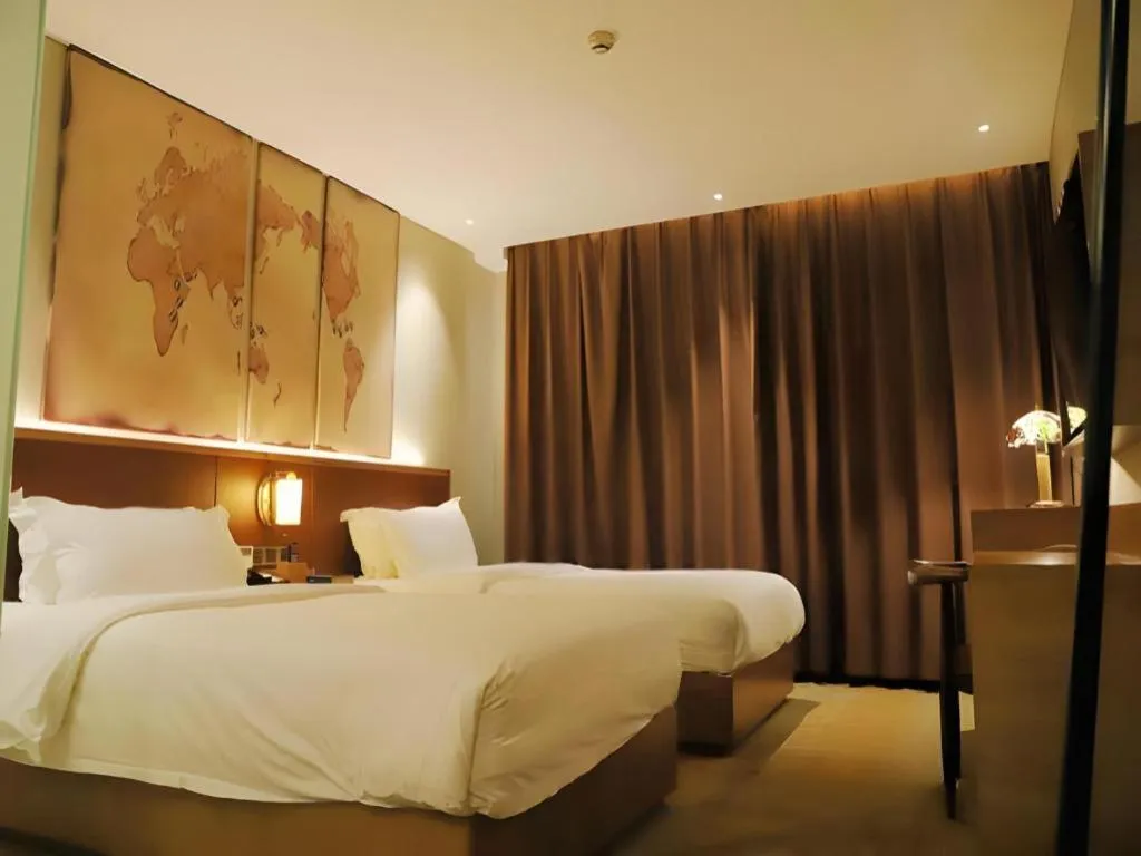 Bed in James Joyce Coffetel Guangzhou Dongxiaonan Metro Station Branch