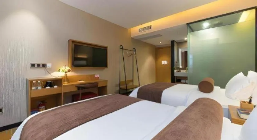 Bed in James Joyce Coffetel Guangzhou Dongxiaonan Metro Station Branch