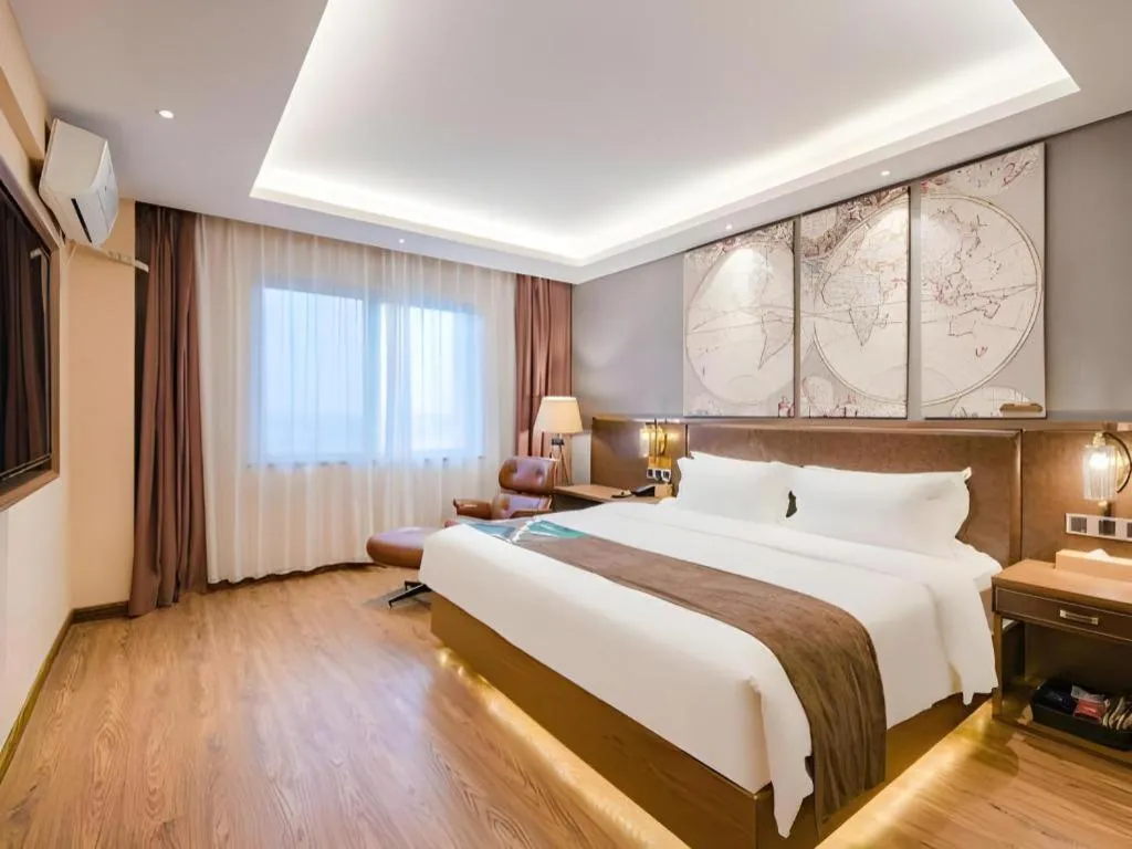 Bed in James Joyce Coffetel Xinyang Xixian Longhu Huayi