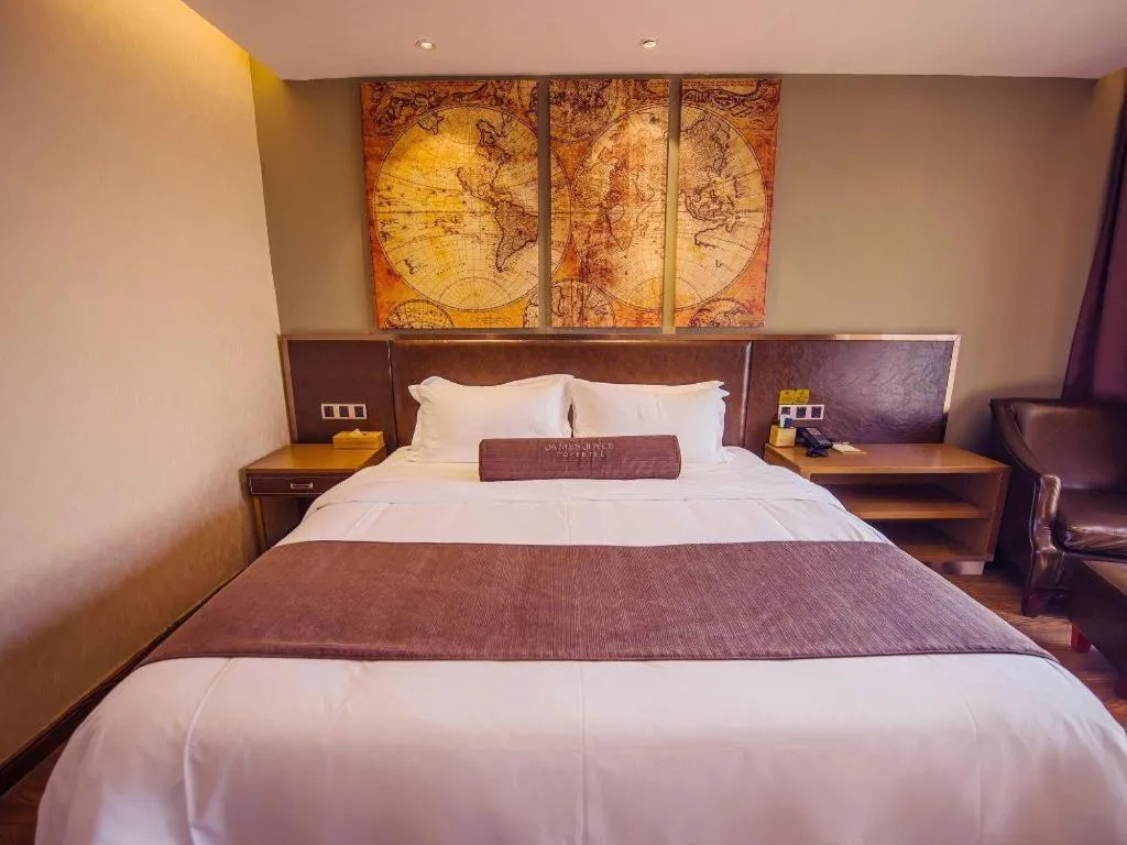 Bed in James Joyce Coffetel Xinyang Xixian Longhu Huayi