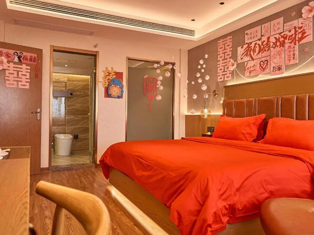 Bed in James Joyce Coffetel Xinyang Xixian Longhu Huayi