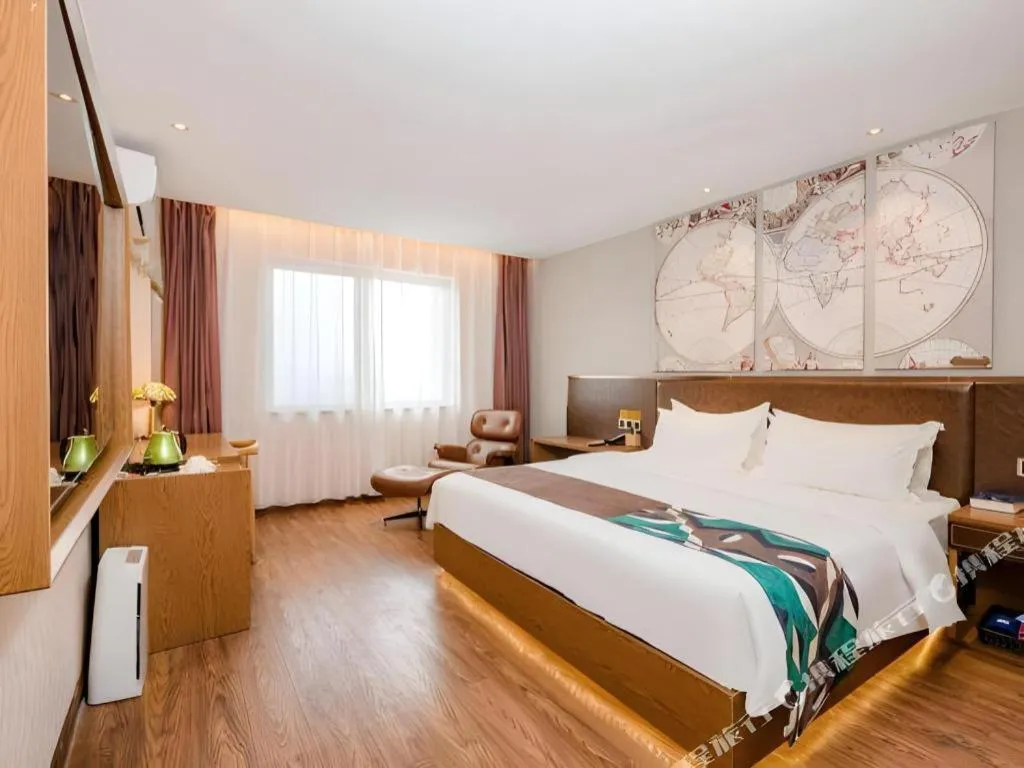 Bed in James Joyce Coffetel Xinyang Xixian Longhu Huayi