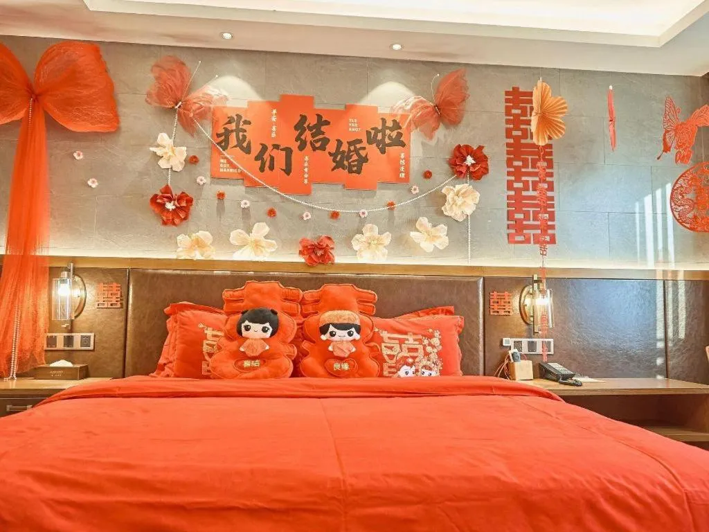 Bed in James Joyce Coffetel Xinyang Xixian Longhu Huayi