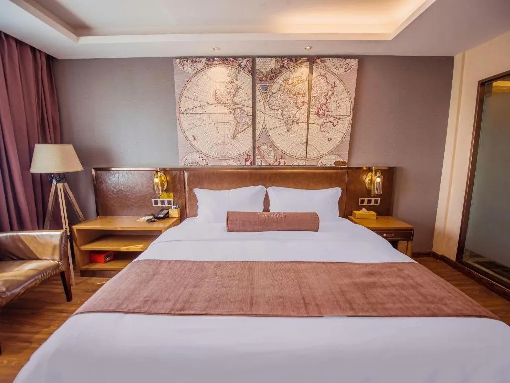 Bed in James Joyce Coffetel Xinyang Xixian Longhu Huayi