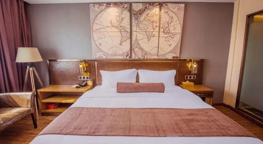 Bed in James Joyce Coffetel Xinyang Xixian Longhu Huayi