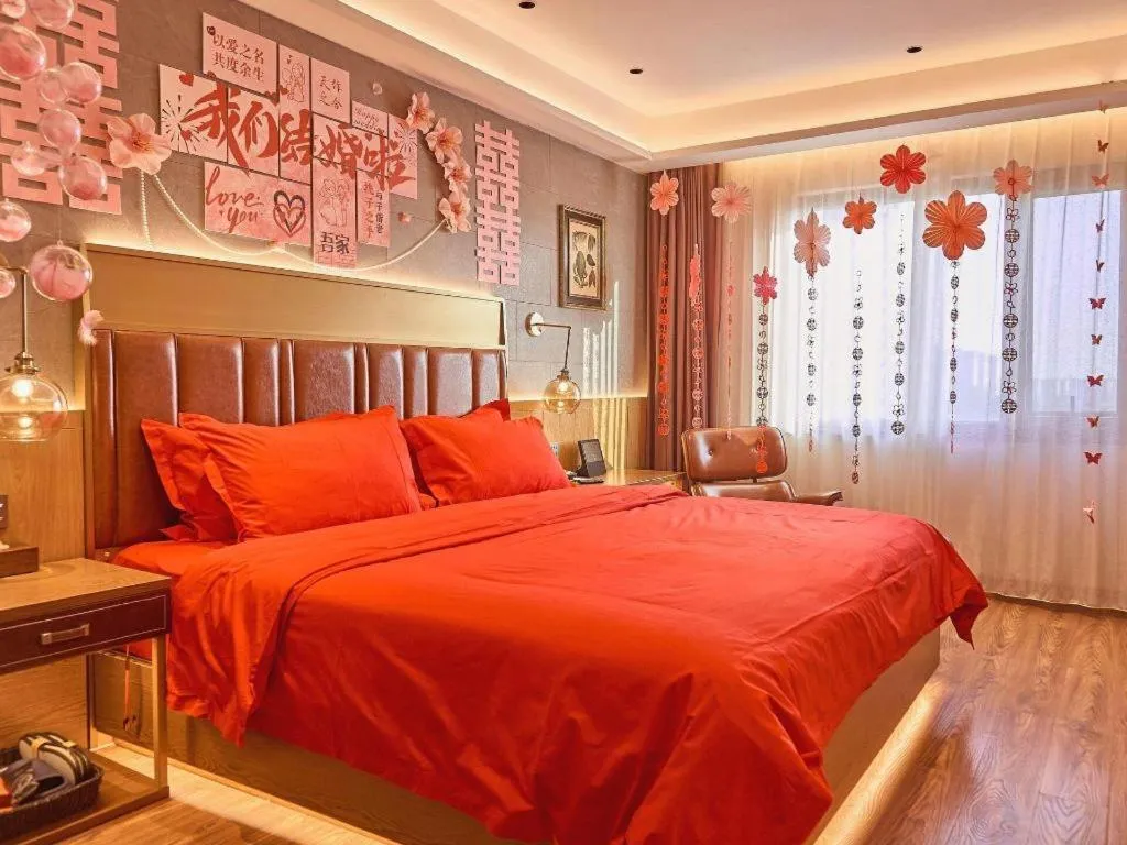 Bed in James Joyce Coffetel Xinyang Xixian Longhu Huayi