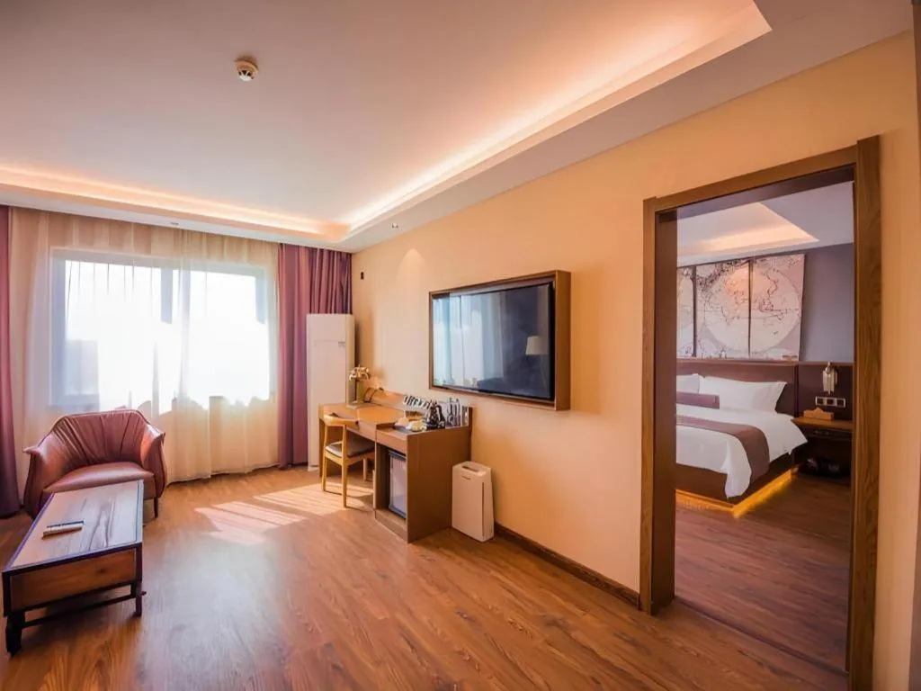 Bed in James Joyce Coffetel Xinyang Xixian Longhu Huayi