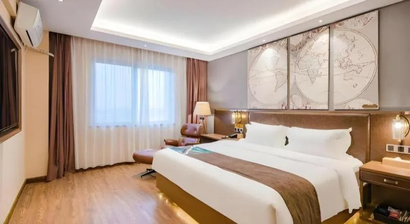 Bed in James Joyce Coffetel Xinyang Xixian Longhu Huayi