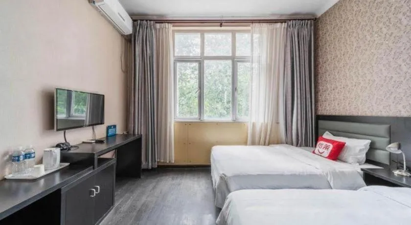 Bed in PAI Hotel Beijing Capital International Airport Linhe Development Zone
