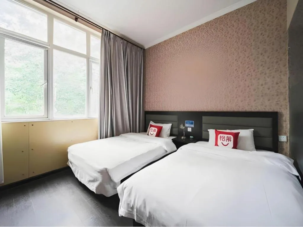 Bed in PAI Hotel Beijing Capital International Airport Linhe Development Zone