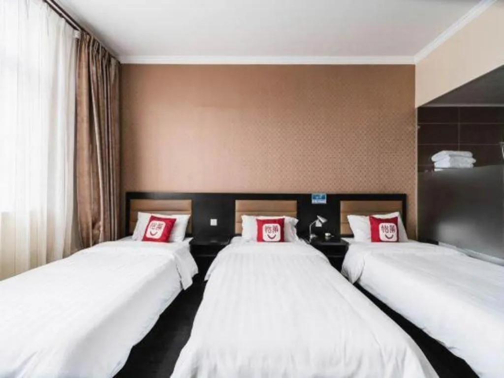 Bed in PAI Hotel Beijing Capital International Airport Linhe Development Zone