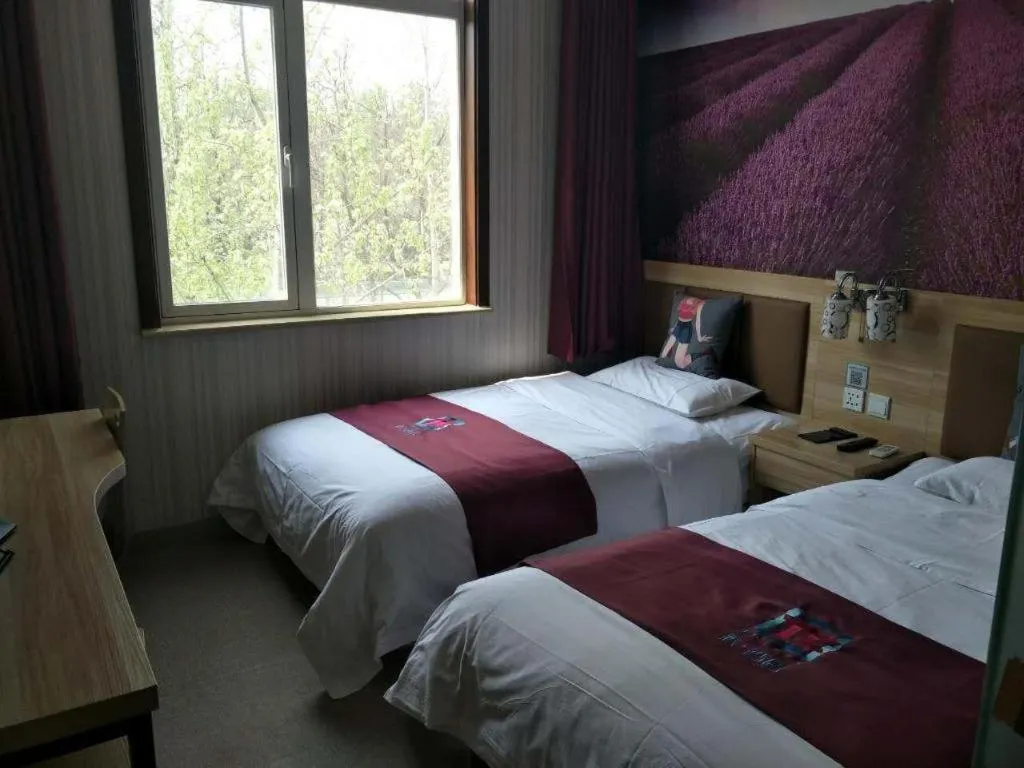 Bed in PAI Hotel Beijing Capital International Airport Linhe Development Zone