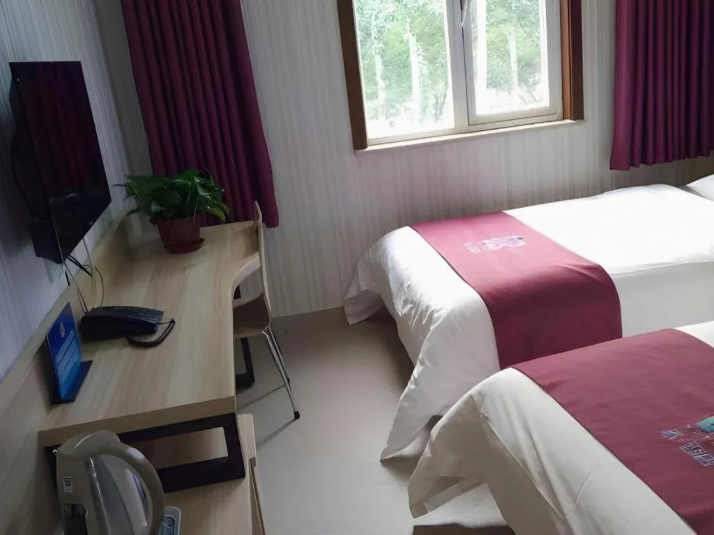 Bed in PAI Hotel Beijing Capital International Airport Linhe Development Zone