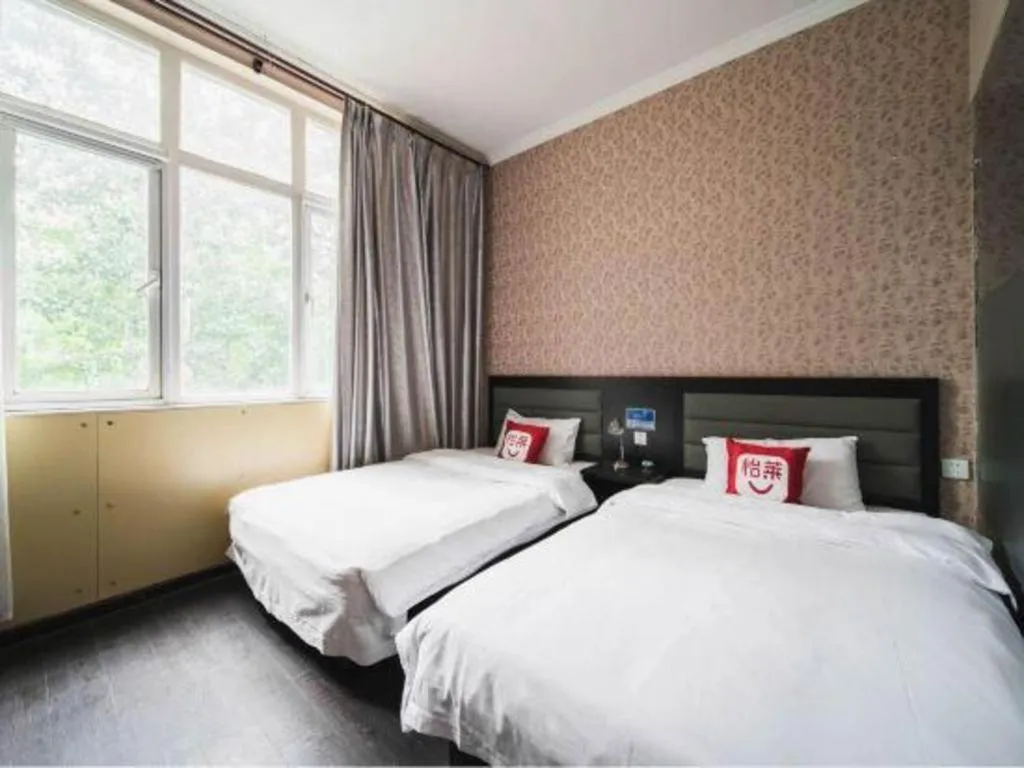 Bed in PAI Hotel Beijing Capital International Airport Linhe Development Zone