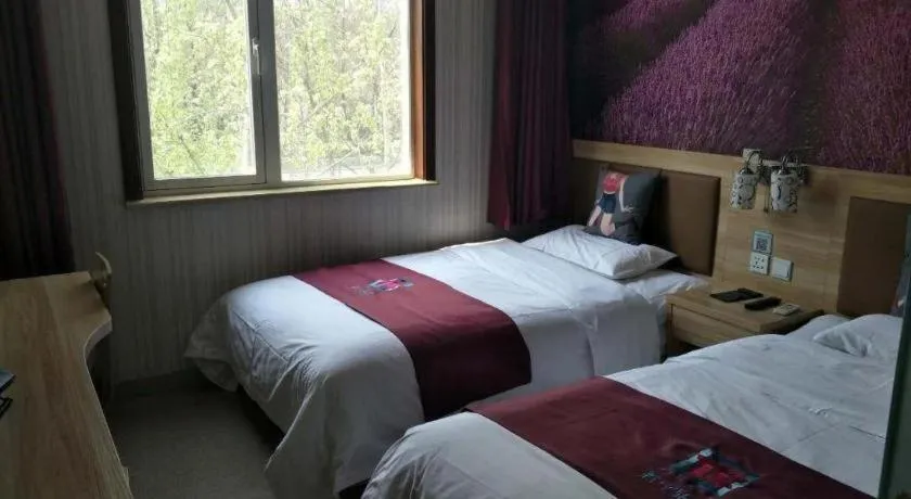 Bed in PAI Hotel Beijing Capital International Airport Linhe Development Zone