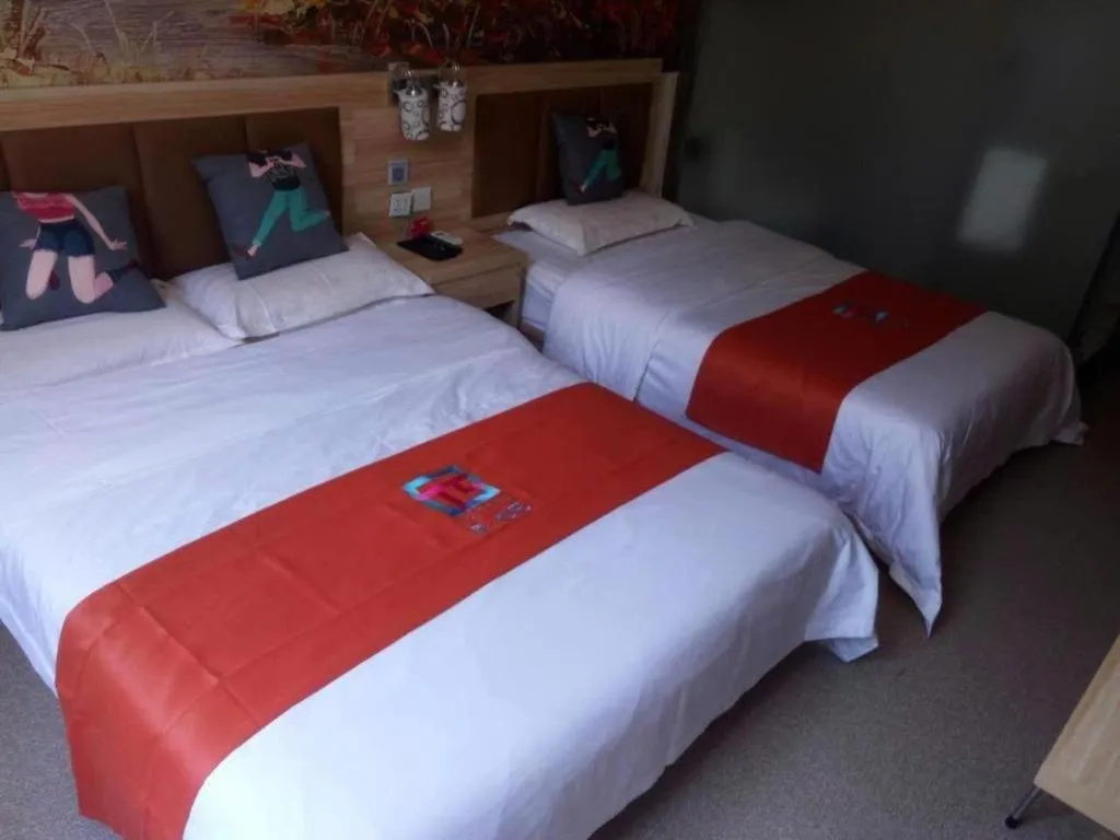 Bed in PAI Hotel Beijing Capital International Airport Linhe Development Zone