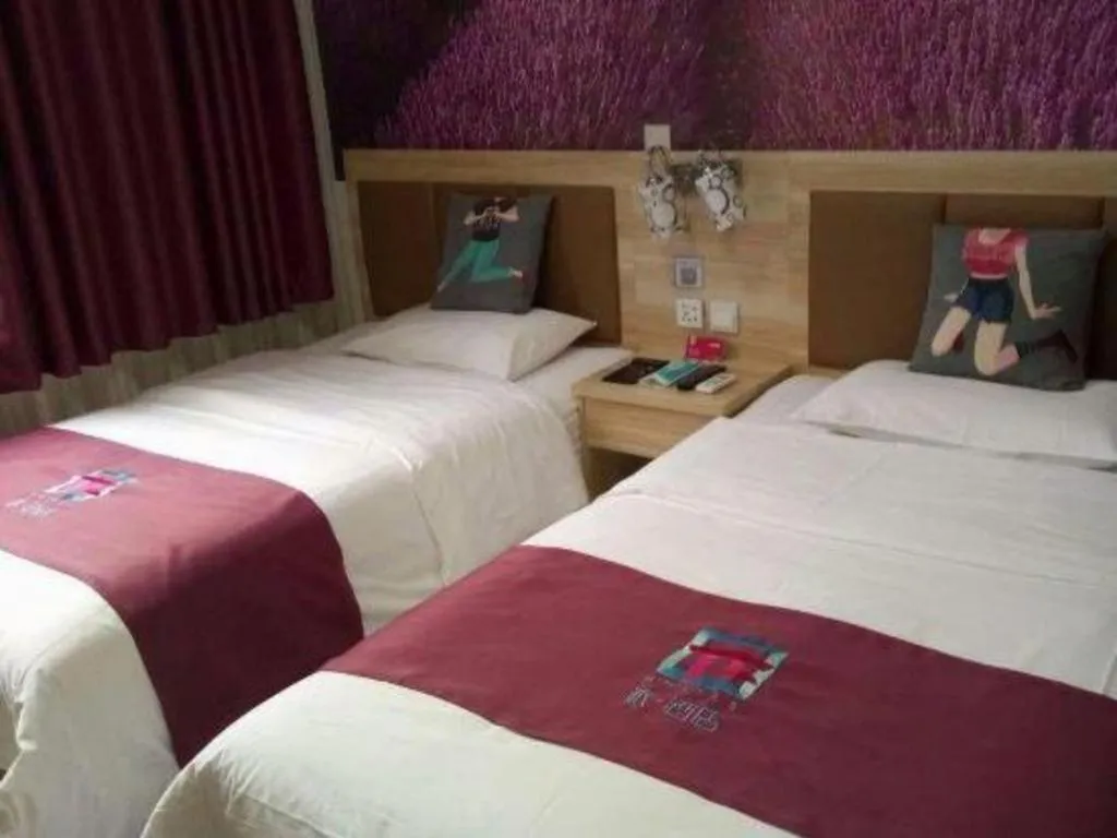 Bed in PAI Hotel Beijing Capital International Airport Linhe Development Zone