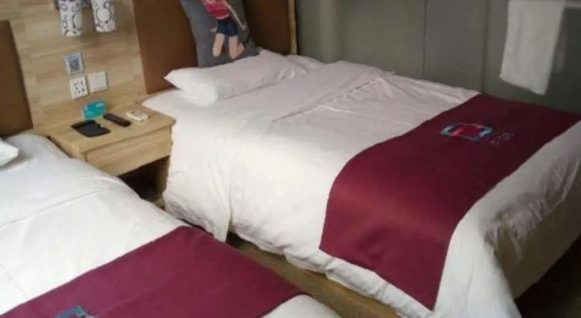 Bed in PAI Hotel Beijing Capital International Airport Linhe Development Zone