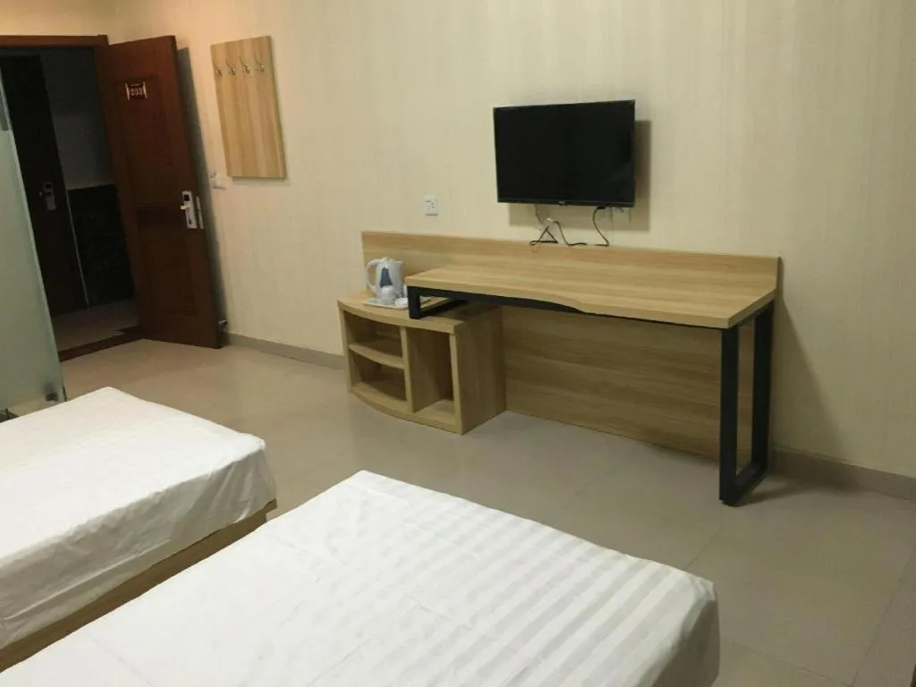 Bed in PAI Hotel Beijing Capital International Airport Linhe Development Zone