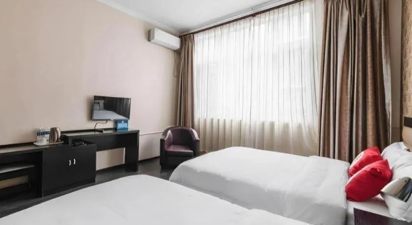 Bed in PAI Hotel Beijing Capital International Airport Linhe Development Zone