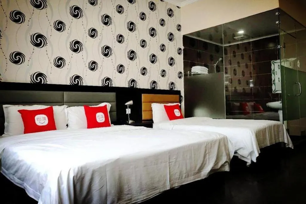 Bed in PAI Hotel Beijing Capital International Airport Linhe Development Zone