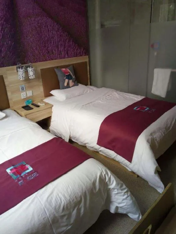 Bed in PAI Hotel Beijing Capital International Airport Linhe Development Zone