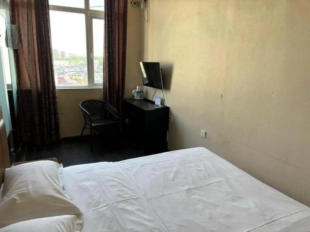 Bed in PAI Hotel Beijing Capital International Airport Linhe Development Zone