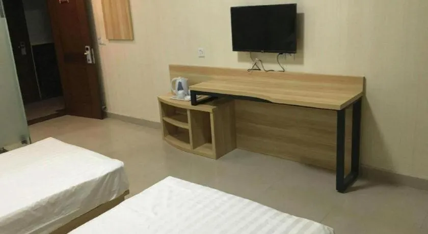 Bed in PAI Hotel Beijing Capital International Airport Linhe Development Zone