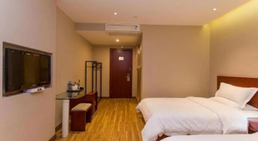 Bed in PAI Hotel Guangzhou North Gate of Chimelong Zoo