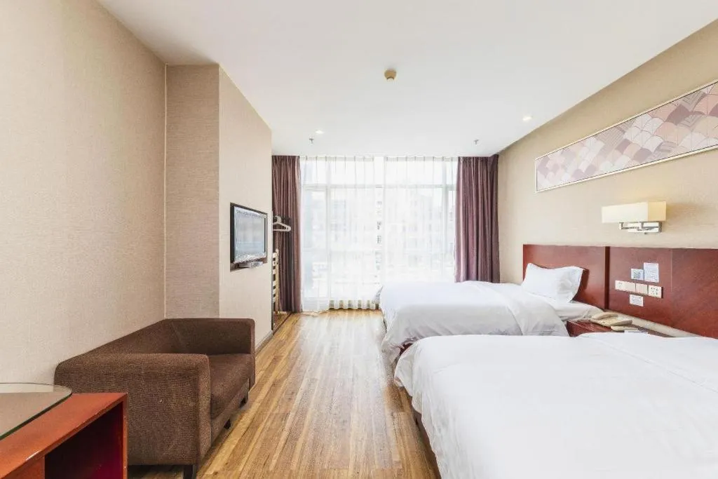 Bed in PAI Hotel Guangzhou North Gate of Chimelong Zoo