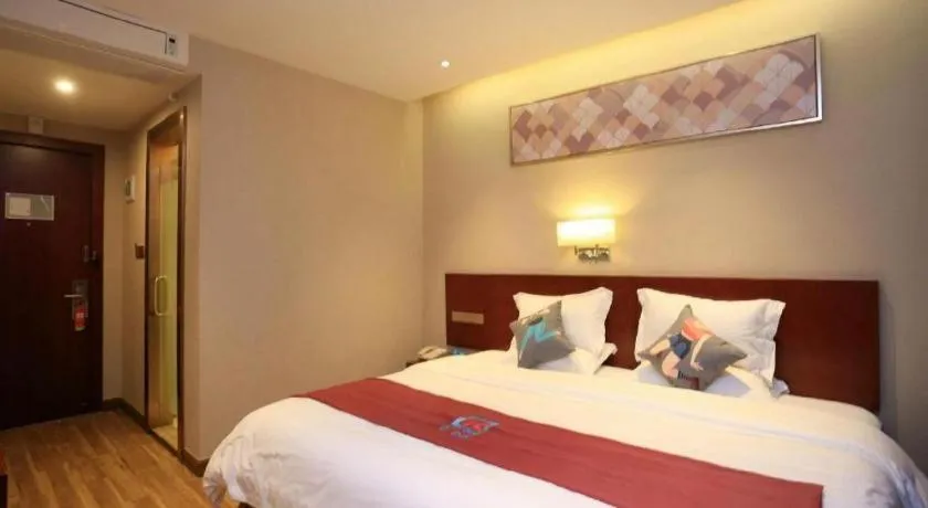 Bed in PAI Hotel Guangzhou North Gate of Chimelong Zoo