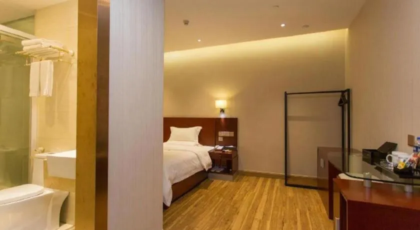 Bed in PAI Hotel Guangzhou North Gate of Chimelong Zoo