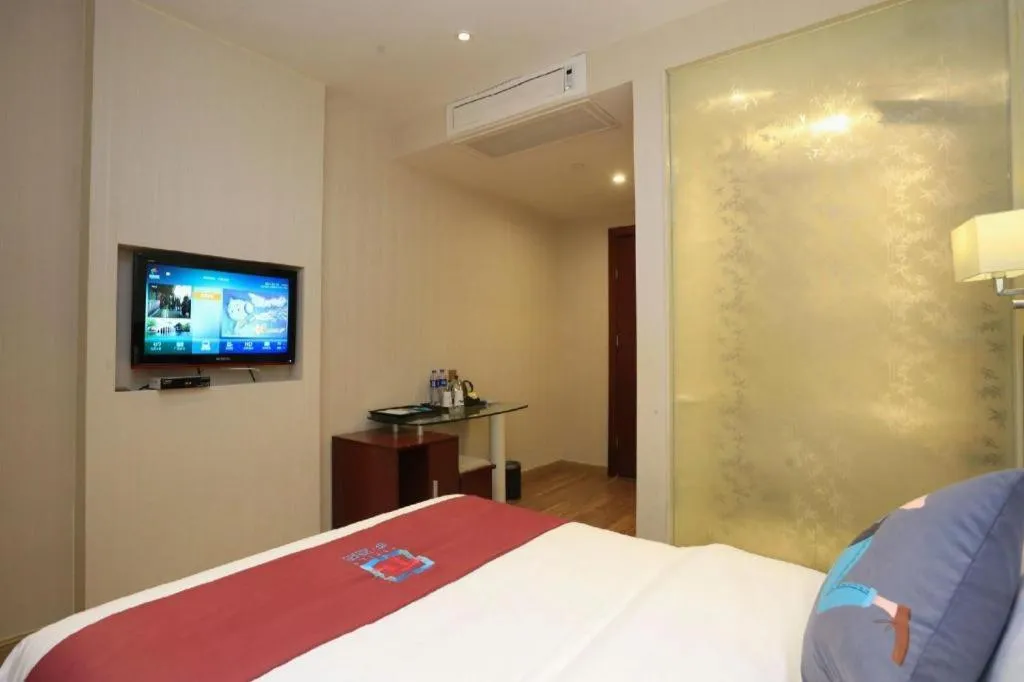 Bed in PAI Hotel Guangzhou North Gate of Chimelong Zoo