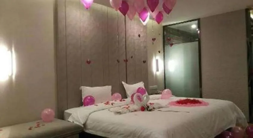 Bed in PAI Hotel Guangzhou North Gate of Chimelong Zoo