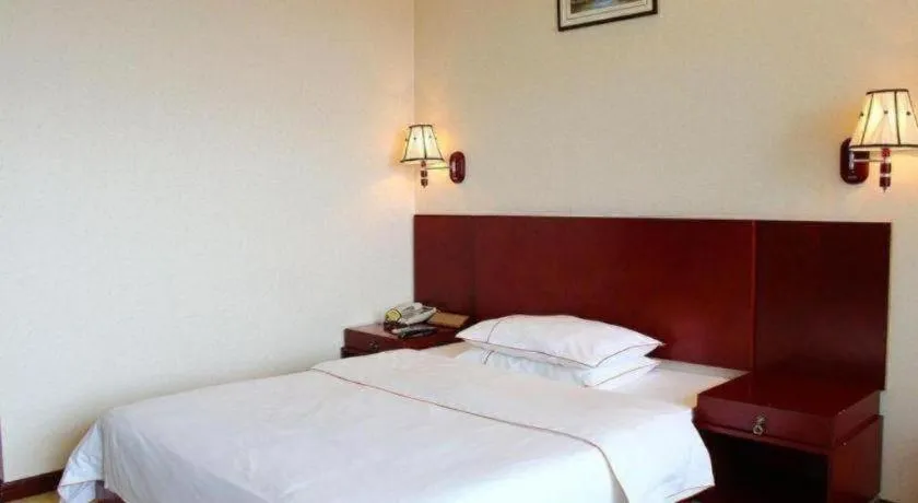 Bed in PAI Hotel Guangzhou North Gate of Chimelong Zoo