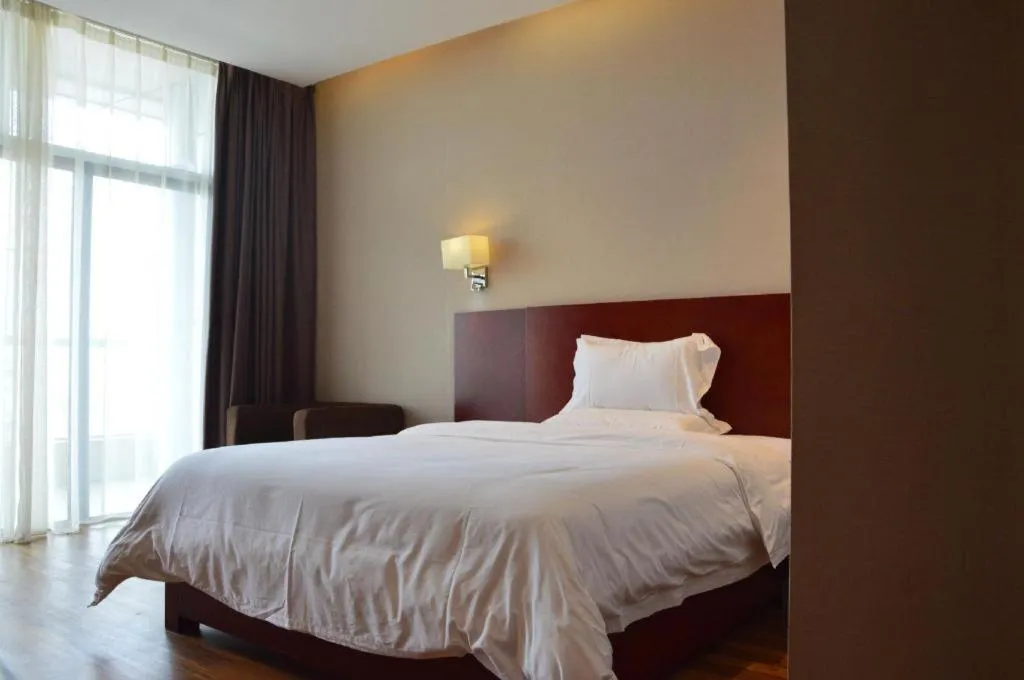 Bed in PAI Hotel Guangzhou North Gate of Chimelong Zoo