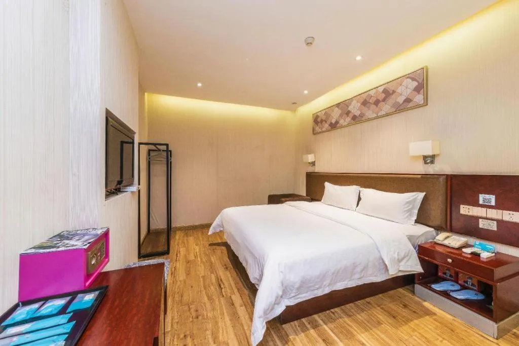 Bed in PAI Hotel Guangzhou North Gate of Chimelong Zoo