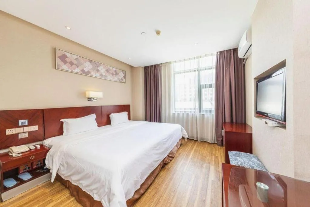 Bed in PAI Hotel Guangzhou North Gate of Chimelong Zoo