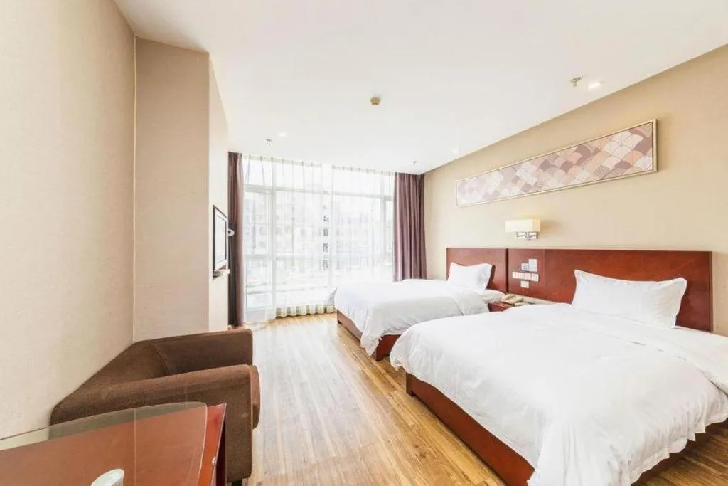 Bed in PAI Hotel Guangzhou North Gate of Chimelong Zoo