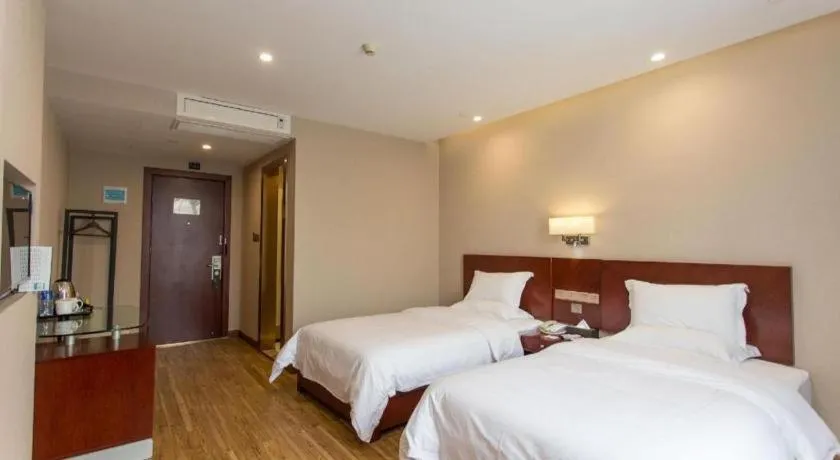 Bed in PAI Hotel Guangzhou North Gate of Chimelong Zoo