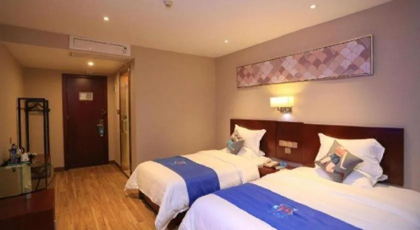 Bed in PAI Hotel Guangzhou North Gate of Chimelong Zoo