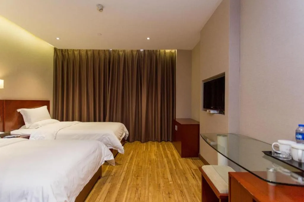 Bed in PAI Hotel Guangzhou North Gate of Chimelong Zoo