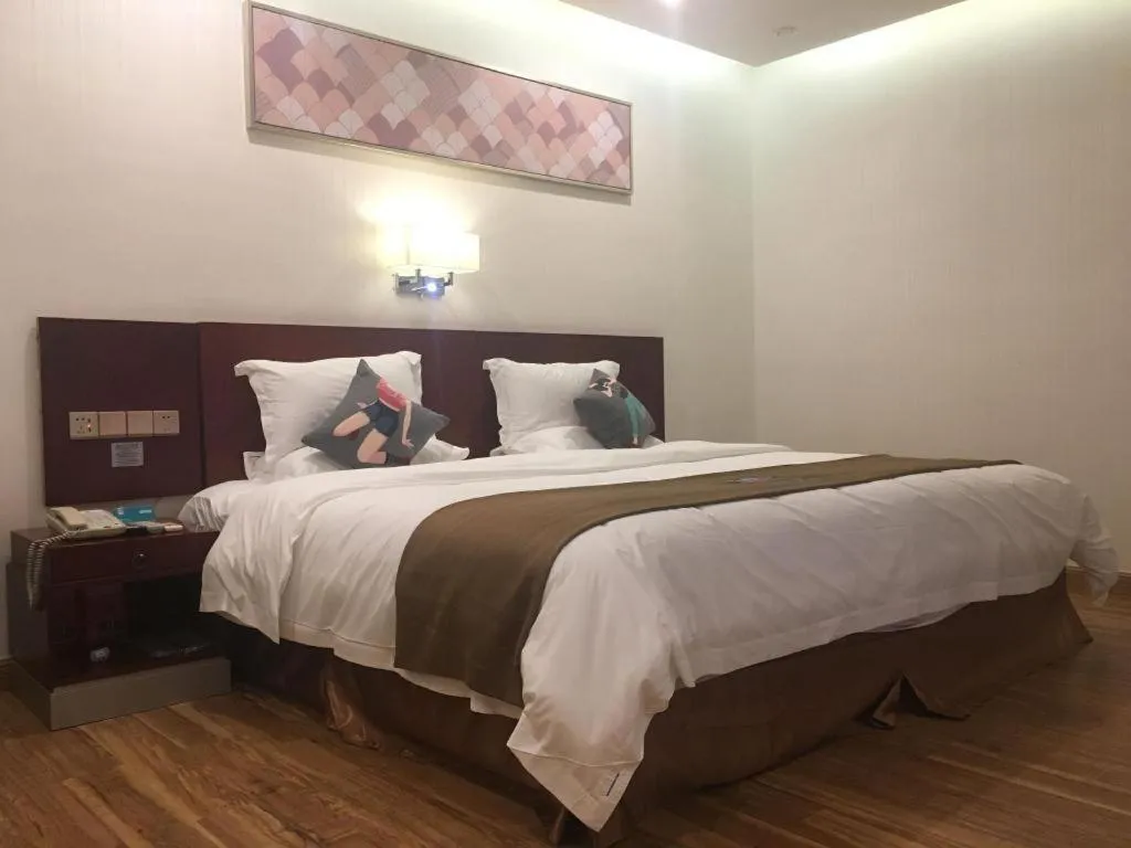 Bed in PAI Hotel Guangzhou North Gate of Chimelong Zoo